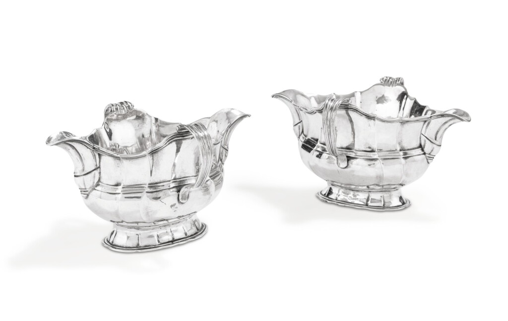View full screen - View 1 of Lot 395. A pair of Belgian silver sauce tureens, spurious marks for Mons 18th century, probably late19th century | Paire de saucières en argent, poinçons apocryphes pour Mons XVIIIe siècle, probablement fin du XIXe siècle.