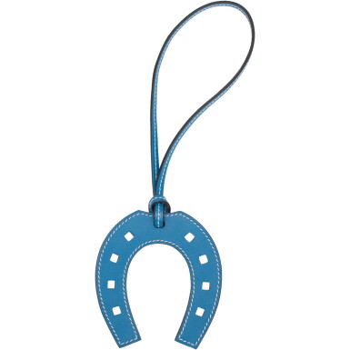 View full screen - View 1 of Lot 119. HERMÈS | MYKONOS PADDOCK HORSESHOE BAG CHARM.