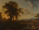 STUDIO OF GEORGE BARRET, R.A. | AN EXTENSIVE WOODED RIVER LANDSCAPE, WITH A TRAVELLER WATERING HIS HORSE IN THE FOREGROUND AND FIGURES ON A BRIDGE BEYOND