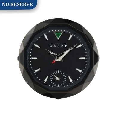 View full screen - View 1 of Lot 438. DLC-COATED STAINLESS STEEL DUAL TIME ZONE DESK CLOCK CIRCA 2012.