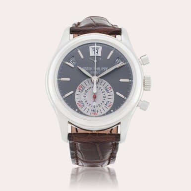 View full screen - View 1 of Lot 195. Reference 5960P | A platinum automatic annual calendar flyback chronograph wristwatch with power reserve and day/night indication, Circa 2008.