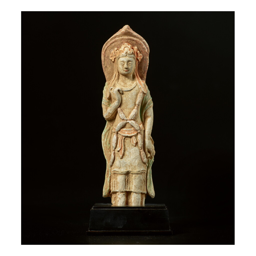 View full screen - View 1 of Lot 597. A POLYCHROME POTTERY FIGURE OF A BODHISATTVA, NORTHERN QI DYNASTY.