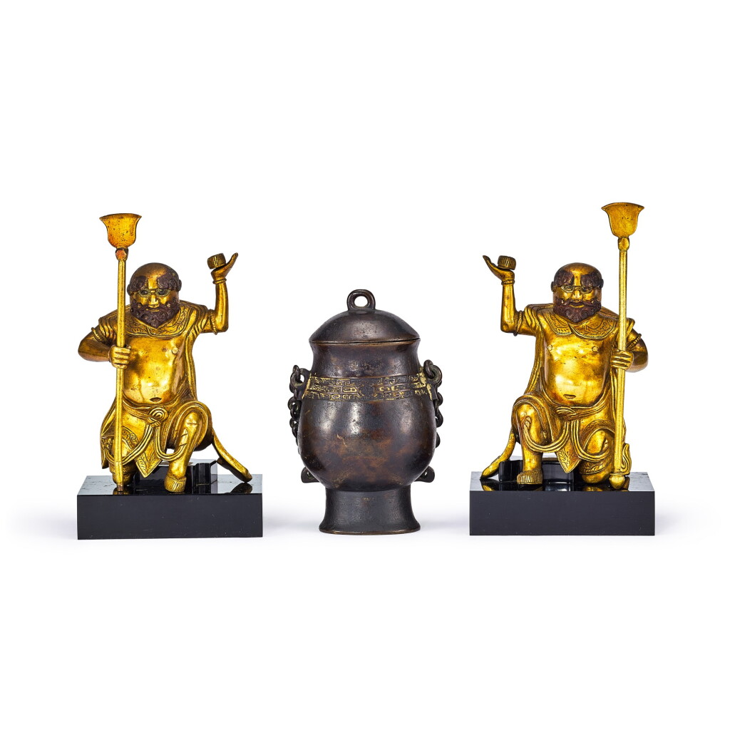 View full screen - View 1 of Lot 2041. A pair of gilt-bronze figures, Qing dynasty, and a bronze archaistic covered vessel, hu, late Ming dynasty | 清 鎏金銅羅漢像一對 及 明末 局部鎏金銅提梁蓋壺.