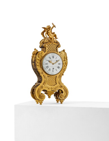 View full screen - View 1 of Lot 62. A Régence gilt-bronze and gilt-brass, tinted pearwood and tortoiseshell marquetry quarter striking mantel clock, attributed to Charles Cressent, the mechanism by Claude Martinot, Paris, dated 1726.