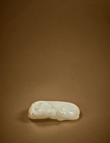 View full screen - View 1 of Lot 132. A white jade carving of a reclining buffalo, Ming dynasty.