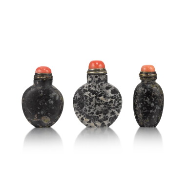 View full screen - View 1 of Lot 123. Two well-hollowed amygdaloidal basalt snuff bottles and a limestone snuff bottle Qing dynasty, 19th century | 清十九世紀 玄武岩鼻煙壺及石灰岩鼻烟壺一組三件.