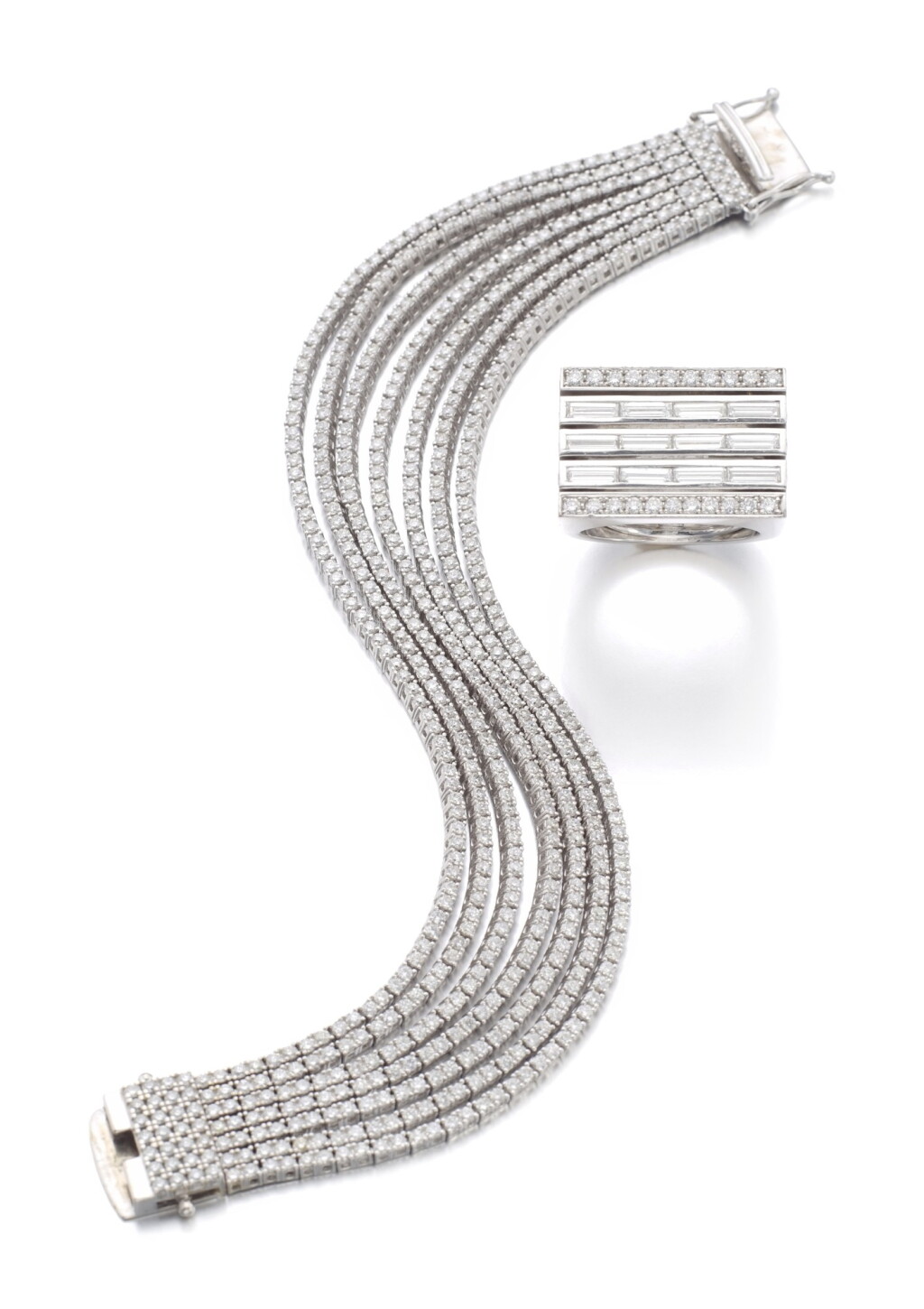 View full screen - View 1 of Lot 49. DIAMOND BRACELET AND A RING.