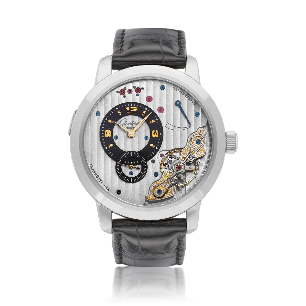 View full screen - View 1 of Lot 8055. PanoInverse XL, Reference 1-66-01-04-34-05 | A white gold semi-skeletonised wristwatch with power reserve indication, Circa 2010 | 格拉蘇蒂 | PanoInverse XL 型號1-66-01-04-34-05 白金半鏤空腕錶,備動力儲備顯示,約2010年製.