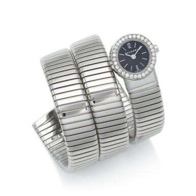 View full screen - View 1 of Lot 247. Serpenti | A stainless steel and diamond-set bangle watch | Circa 1980.