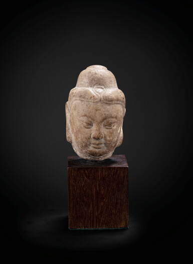 View full screen - View 1 of Lot 39. A small marble head of Buddha Tang dynasty | 唐 大理石雕佛首.