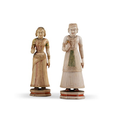 View full screen - View 1 of Lot 244. Two partly polychrome stained and carved ivory figures, the king and his queen, India, probably Rajasthan, mid-19th century | Deux sculptures en ivoire gravé et partiellement teinté en polychromie, figurant un maharana et sa compagne, Inde, probablement Rajasthan, milieu du XIXe siècle.