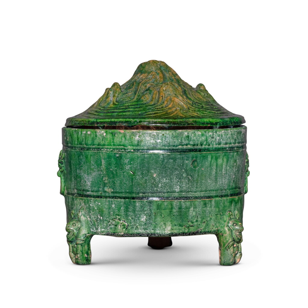 View full screen - View 1 of Lot 21. A green-glazed pottery tripod censer and cover (Boshanlu), Han dynasty.
