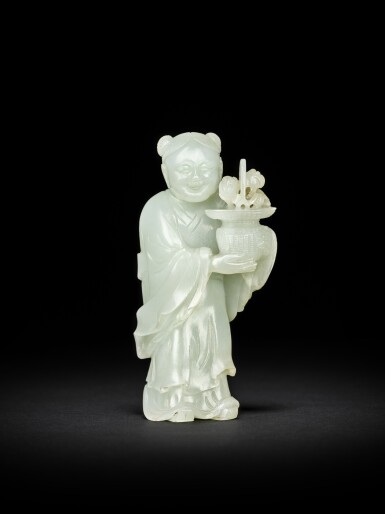 View full screen - View 1 of Lot 2. A pale celadon jade figure of an immortal, Qing dynasty, Qianlong period | 清乾隆 青白玉仙人立像.