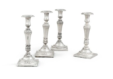 View full screen - View 1 of Lot 92. A German silver set of four candlesticks, 2, maker A & B, two, W.H, Berlin, circa 1820 | Ensemble de quatre flambeaux en argent, deux par orfèvre A & B, deux par orfèvre W.H, Berlin, vers 1820.