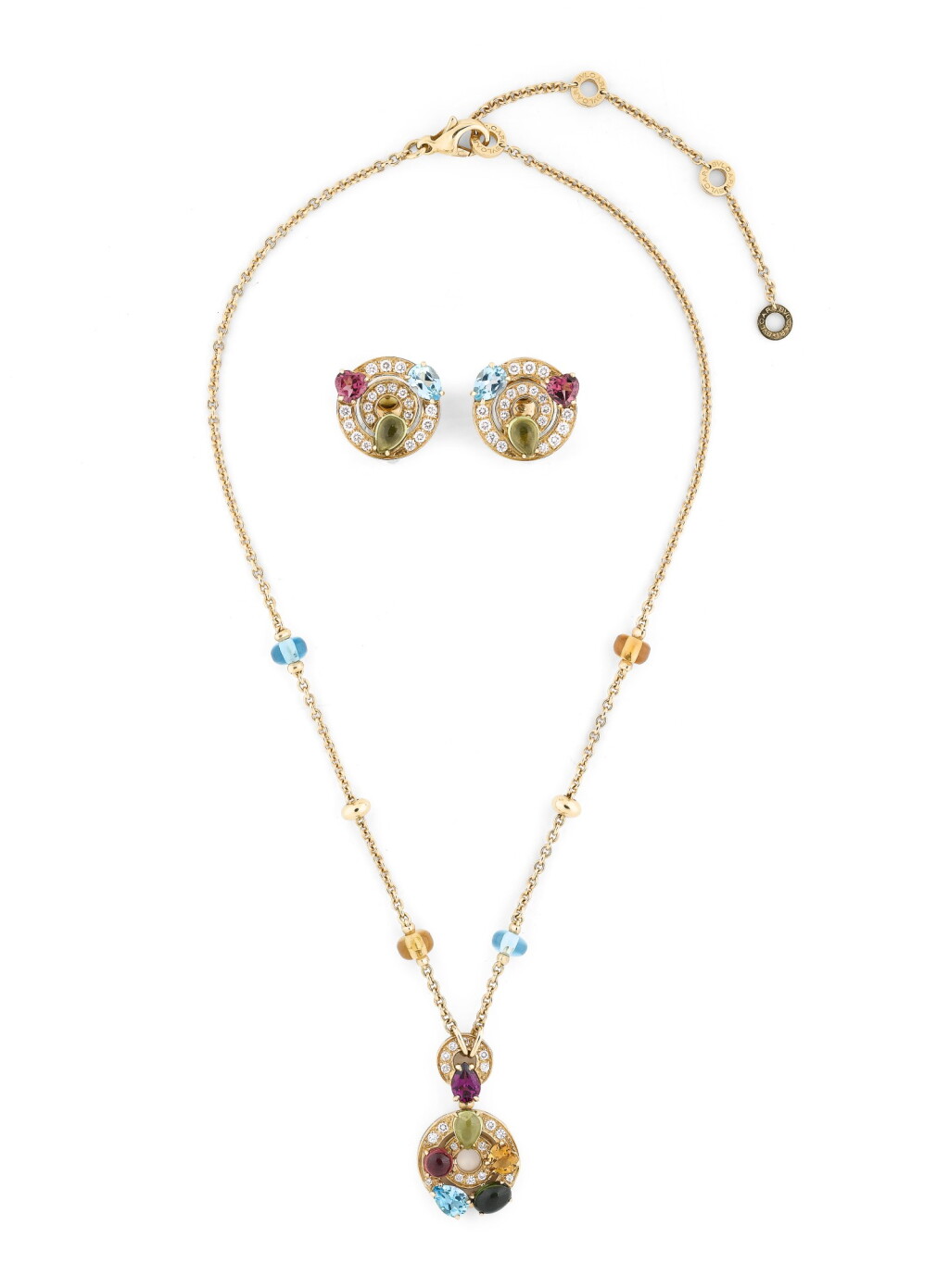 View full screen - View 1 of Lot 144. BULGARI | DEMI-PARURE PIERRES DE COULEUR ET DIAMANTS | GEM SET AND DIAMOND DEMI-PARURE.