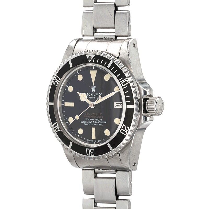 View full screen - View 1 of Lot 1002. 'Double Red' Sea-Dweller Mark III, Sumariner 2000 - 610 m, Ref. 1665 Montre bracelet en acier avec date et bracelet | Stainless steel wristwatch with date and bracelet Vers 1974| Circa 1974.