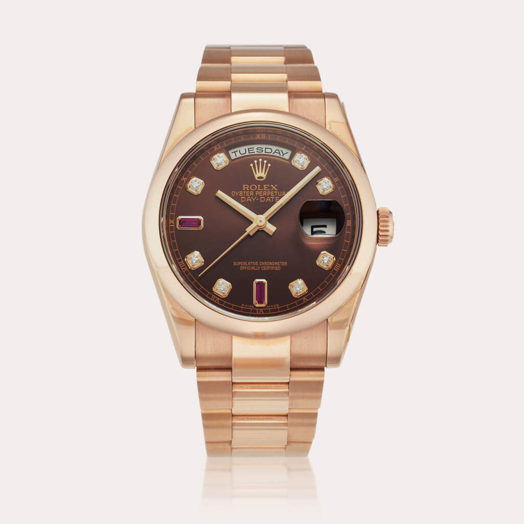 View full screen - View 1 of Lot 162. Reference 118205 Day-Date | A pink gold, diamond and ruby-set automatic wristwatch with day, date and bracelet, Circa 2013.