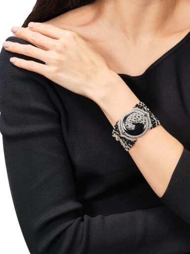View full screen - View 1 of Lot 1818. A Limited Production 'Panthère' Diamond, Onyx and Gem Set Secret Bracelet Watch | 卡地亞 | 限量出產 'Panthère' 鑽石 配 縞瑪瑙 及 寶石 腕錶.