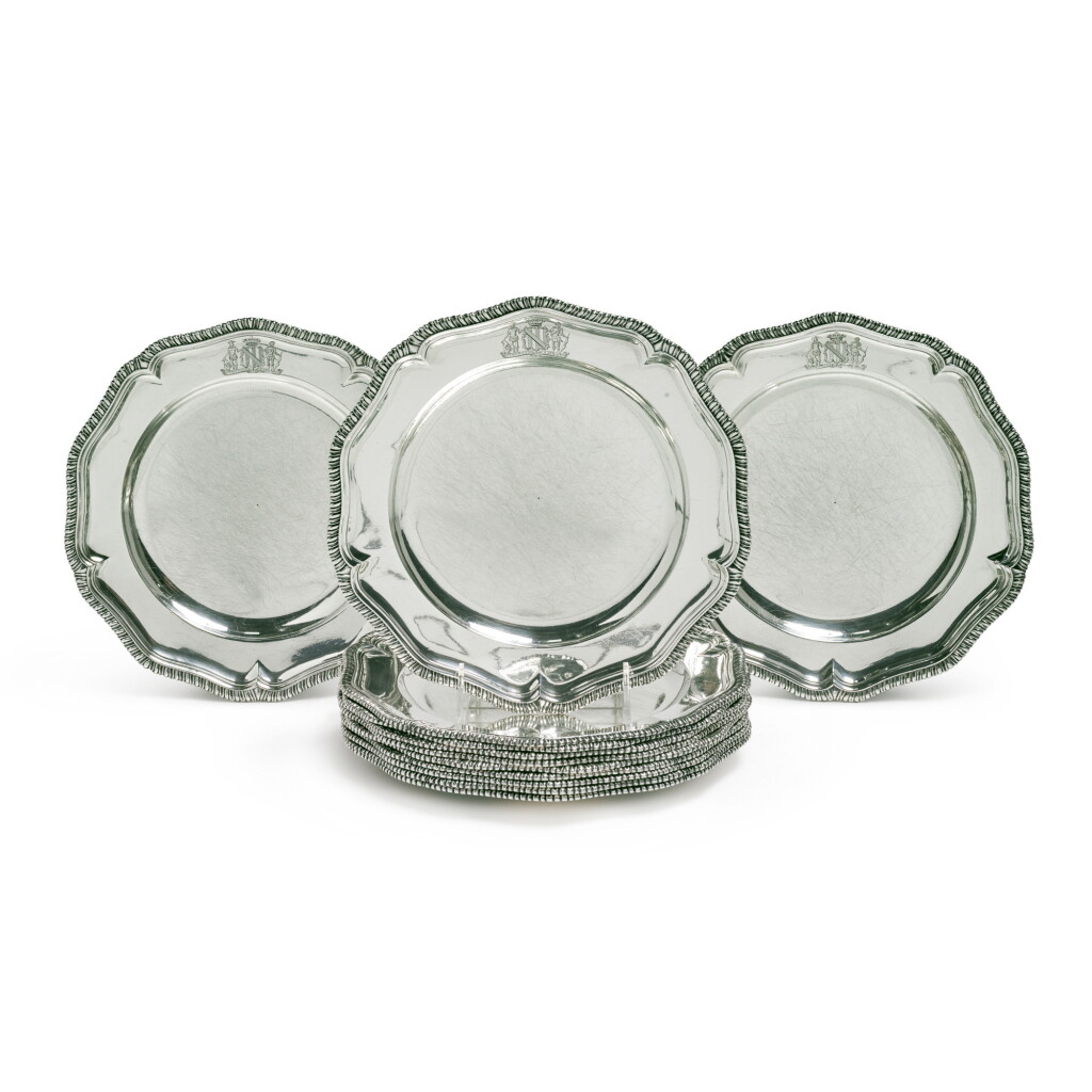 View full screen - View 1 of Lot 216. A SET OF TWELVE GEORGE II SILVER DINNER PLATES, GEORGE WICKES, LONDON, 1741.