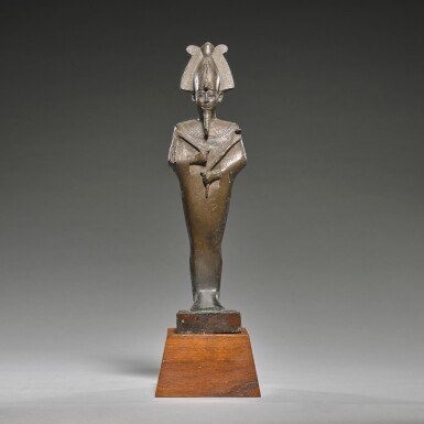 View full screen - View 1 of Lot 61. AN EGYPTIAN BRONZE FIGURE OF OSIRIS, 26TH DYNASTY, 664-525 B.C..