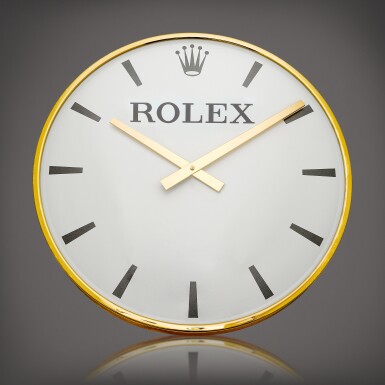 View full screen - View 1 of Lot 850. A gilt brass wall clock, Circa 1960 | 勞力士 | 鍍金銅製掛牆鐘,約1960年製.