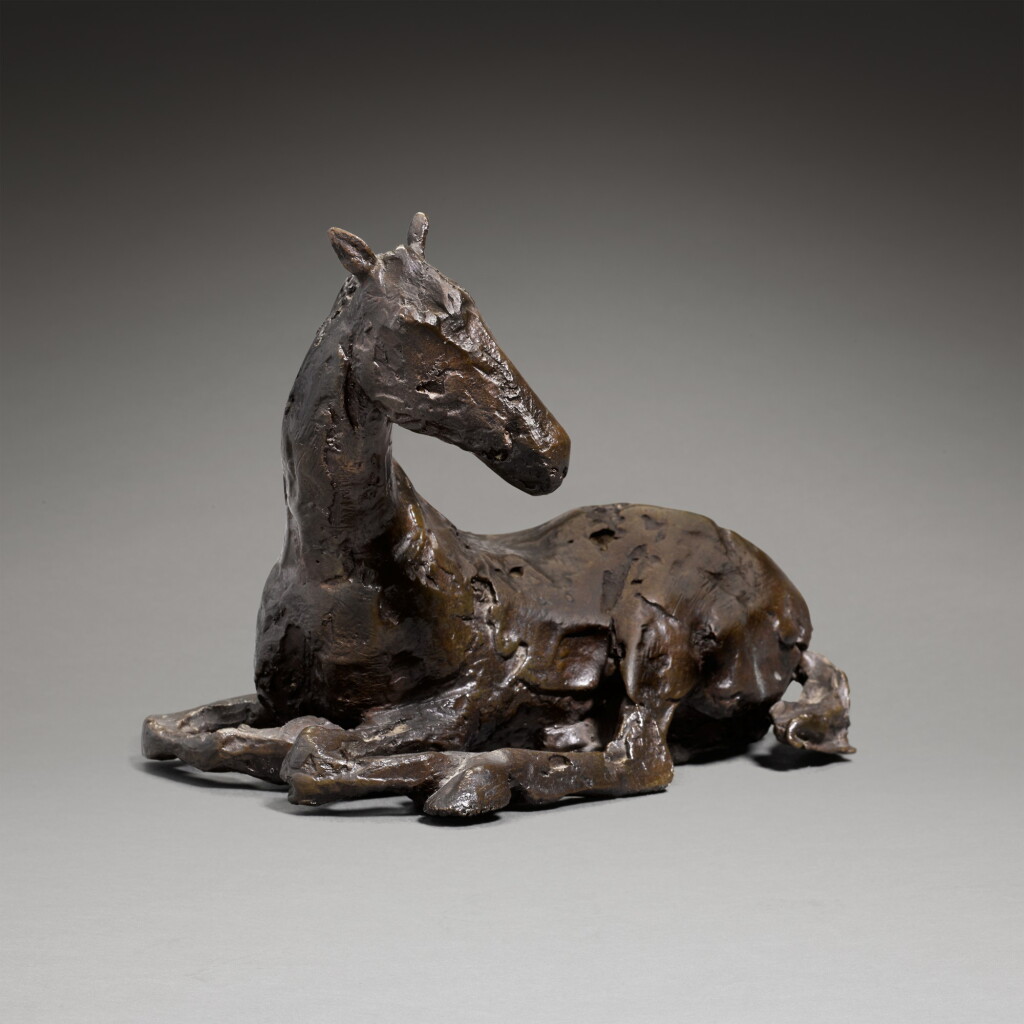 View full screen - View 1 of Lot 208. Small Sitting Down Horse.