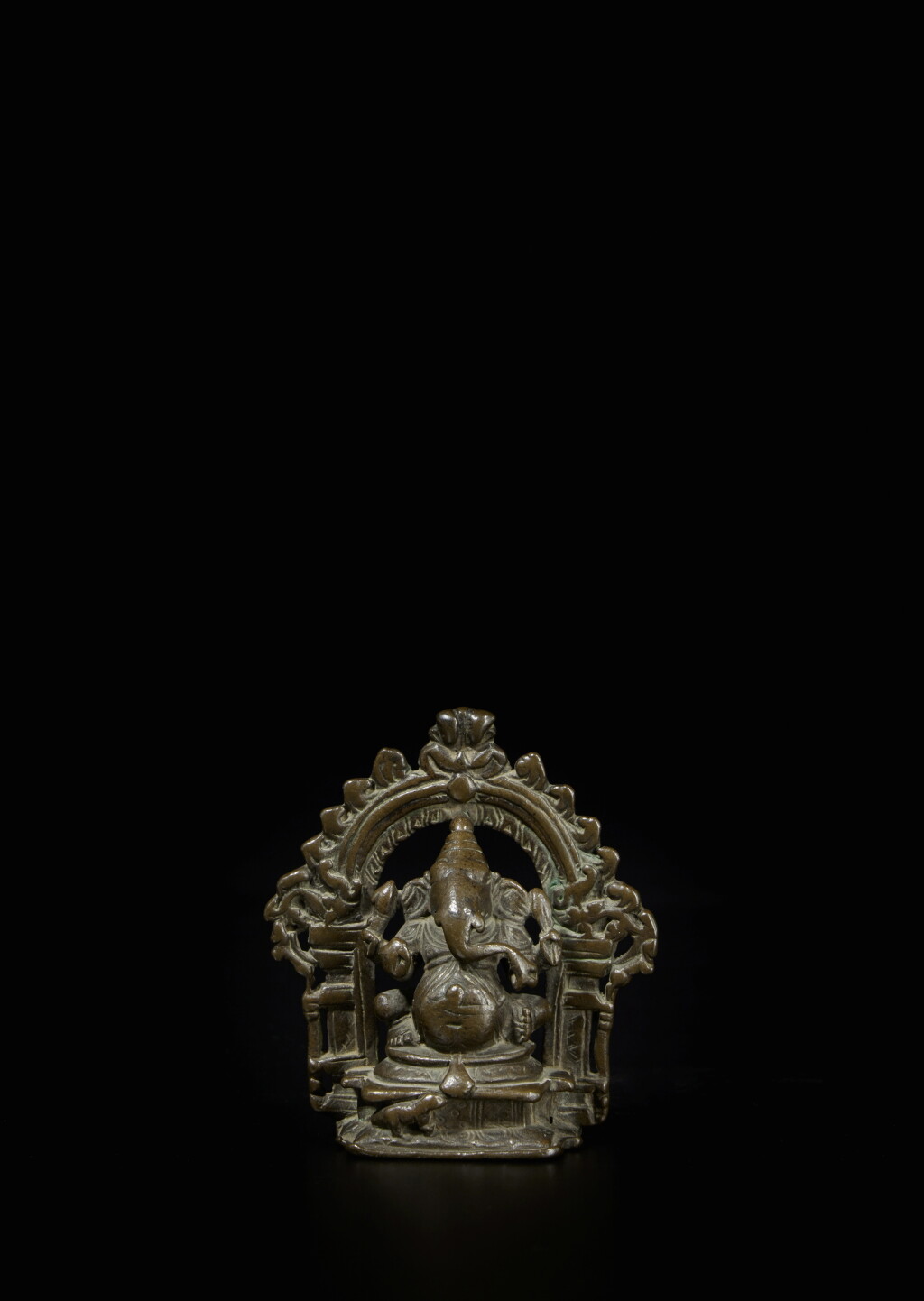 View full screen - View 1 of Lot 857. A small bronze figure of Ganesha, Southern India, circa 16th century.