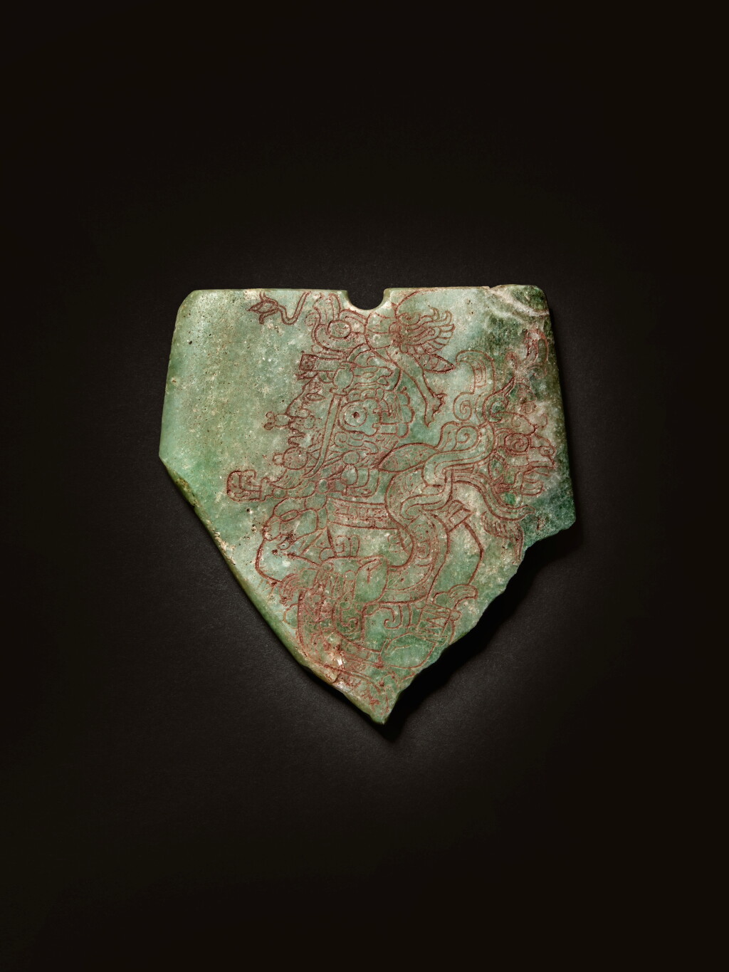 View full screen - View 1 of Lot 19. Maya Incised Jade Celt.