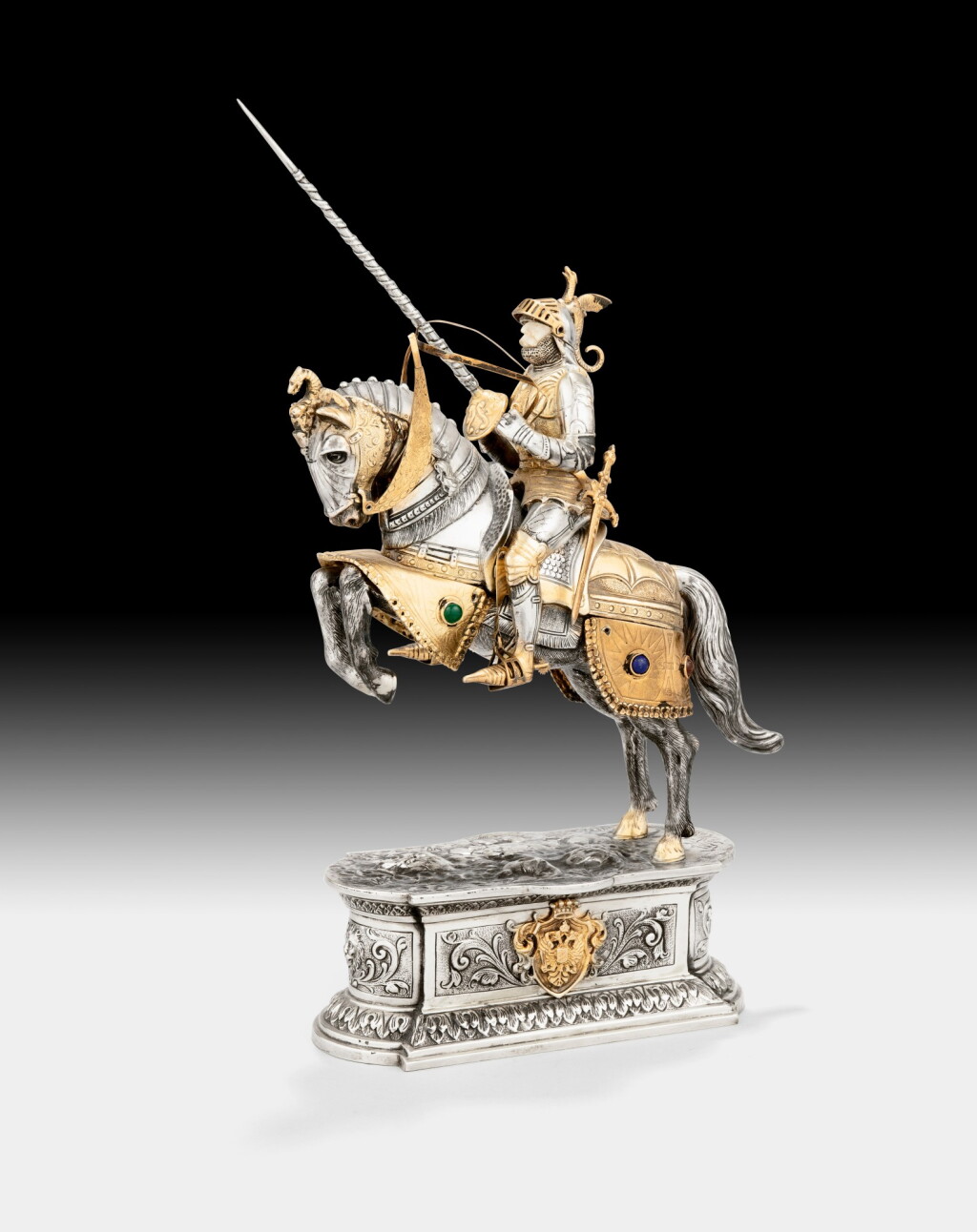 View full screen - View 1 of Lot 249. A parcel-gilt silver and ivory chess piece (knight), unmarked, probably Hanau, circa 1900 | Grande pièce d'échec cavalier en argent, vermeil et ivoire, apparemment non poinçonnée, probablement Hanau, vers 1900.