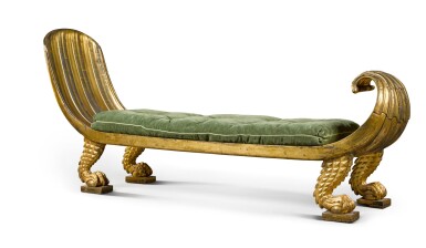 View full screen - View 1 of Lot 163. A Regency parcel gilt and carved giltwood 'Egyptian Revival' daybed, circa 1815.