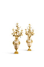 A pair of Louis XVI gilt-bronze mounted alabaster three-light candelabra, circa 1780 | Paire de candélabres à trois lumières en albâtre et bronze doré d'époque Louis XVI, vers 1780