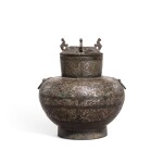 A silver-inlaid bronze 'dragon' wine vessel and cover, hu, Eastern Zhou dynasty, Warring States period | 東周戰國 銅錯銀變體龍紋蓋壺