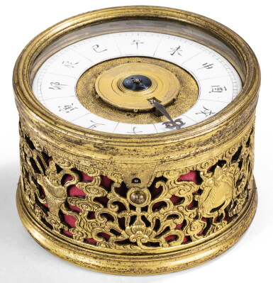 View full screen - View 1 of Lot 32. RARE HORLOGE EN BRONZE DORÉ DYNASTIE QING, BEIJING, XVIIIE SIÈCLE | 清十八世紀 鎏金銅八寶紋子午醒鐘 | A rare Beijing circular clock with gilt-metal case, Qing Dynasty, 18th century.