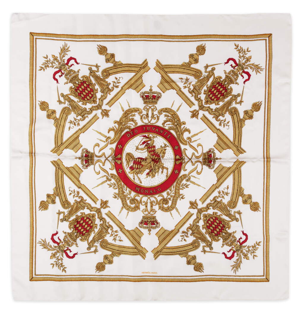 View full screen - View 1 of Lot 64. Ivory White, Red and Gold Silk Print Deo Juvante Monaco Scarf, Cir 2011.