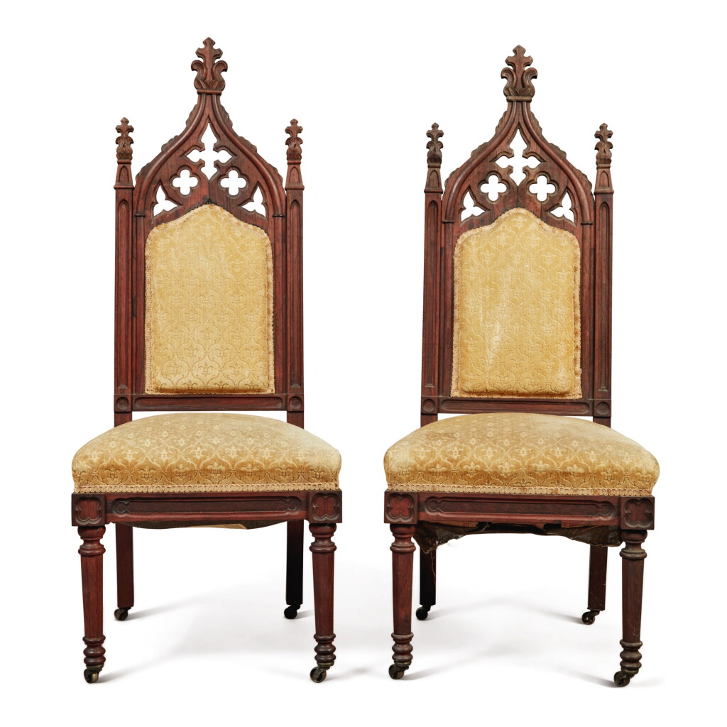 View full screen - View 1 of Lot 770. A PAIR OF ROSEWOOD NEO-GOTHIC SIDE CHAIRS ON CASTORS, 19TH CENTURY.