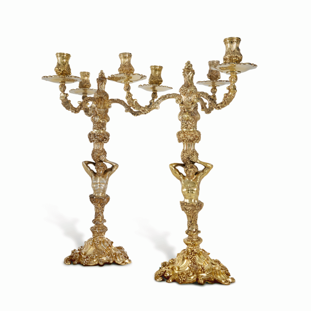 View full screen - View 1 of Lot 168. Two Matching English Silver-Gilt Three-Light Candelabra, Asprey & Co. Ltd., London, 1975 and 1977.