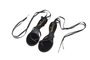 View full screen - View 1 of Lot 109. CHANEL | PAIR OF BLACK LEATHER THONG SANDALS .