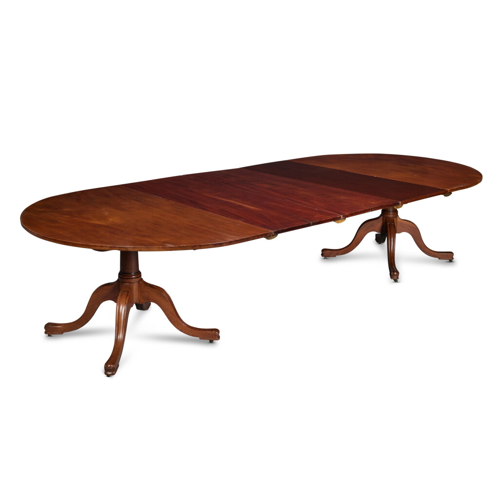 View full screen - View 1 of Lot 366. A George III Style Double Pedestal Mahogany Dining Table.