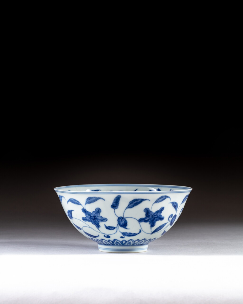 View full screen - View 1 of Lot 150. A Ming-style blue and white 'Palace' bowl, Qing dynasty, Yongzheng period | 清雍正 青花仿成化纏枝秋葵紋宮盌《大明成化年製 》仿款.