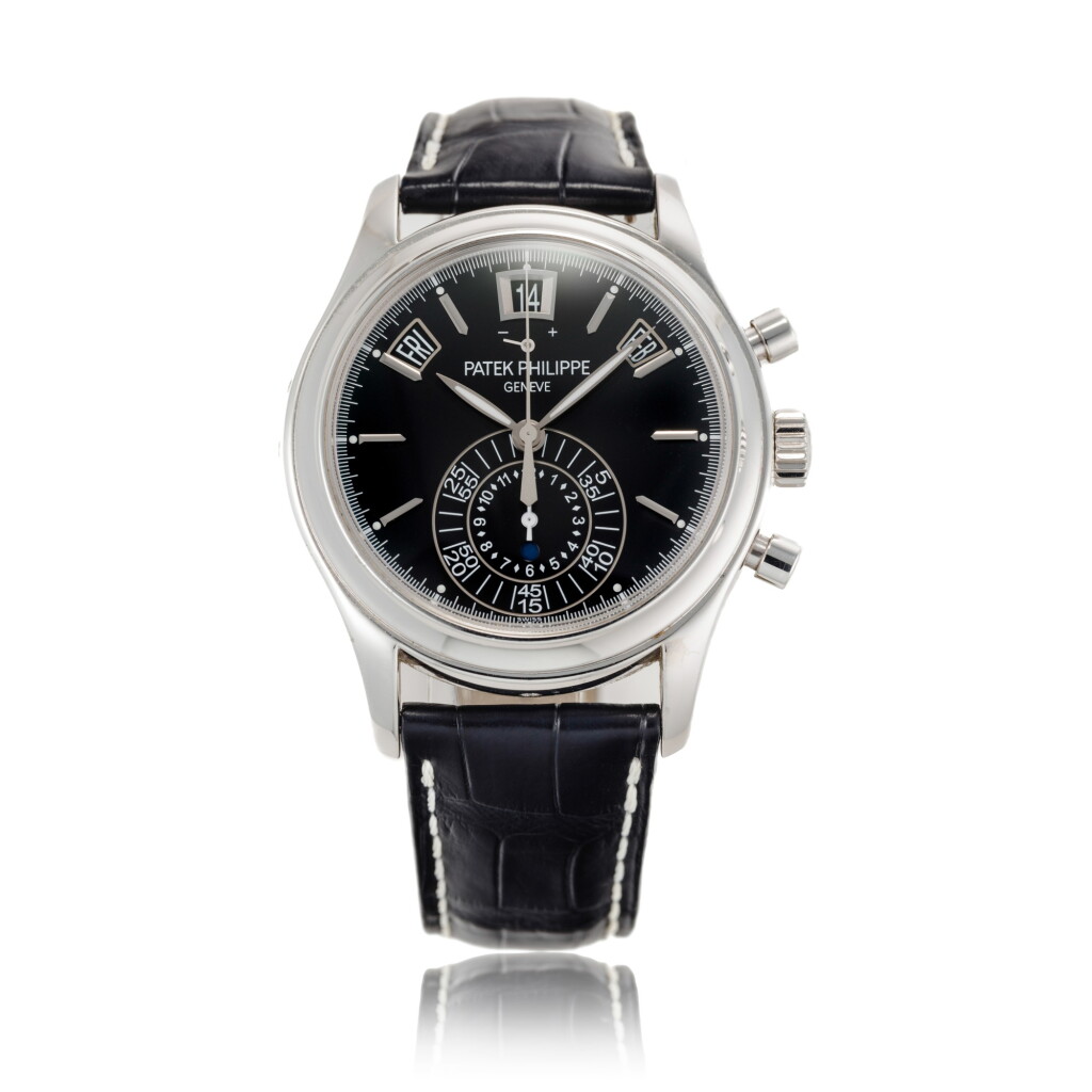 View full screen - View 1 of Lot 131. Reference 5960 | A platinum automatic annual calendar fly back chronograph wristwatch, Circa 2013 | 百達翡麗 5960 | 型號鉑金自動上鏈年曆飛返計時腕錶,約2013年製.