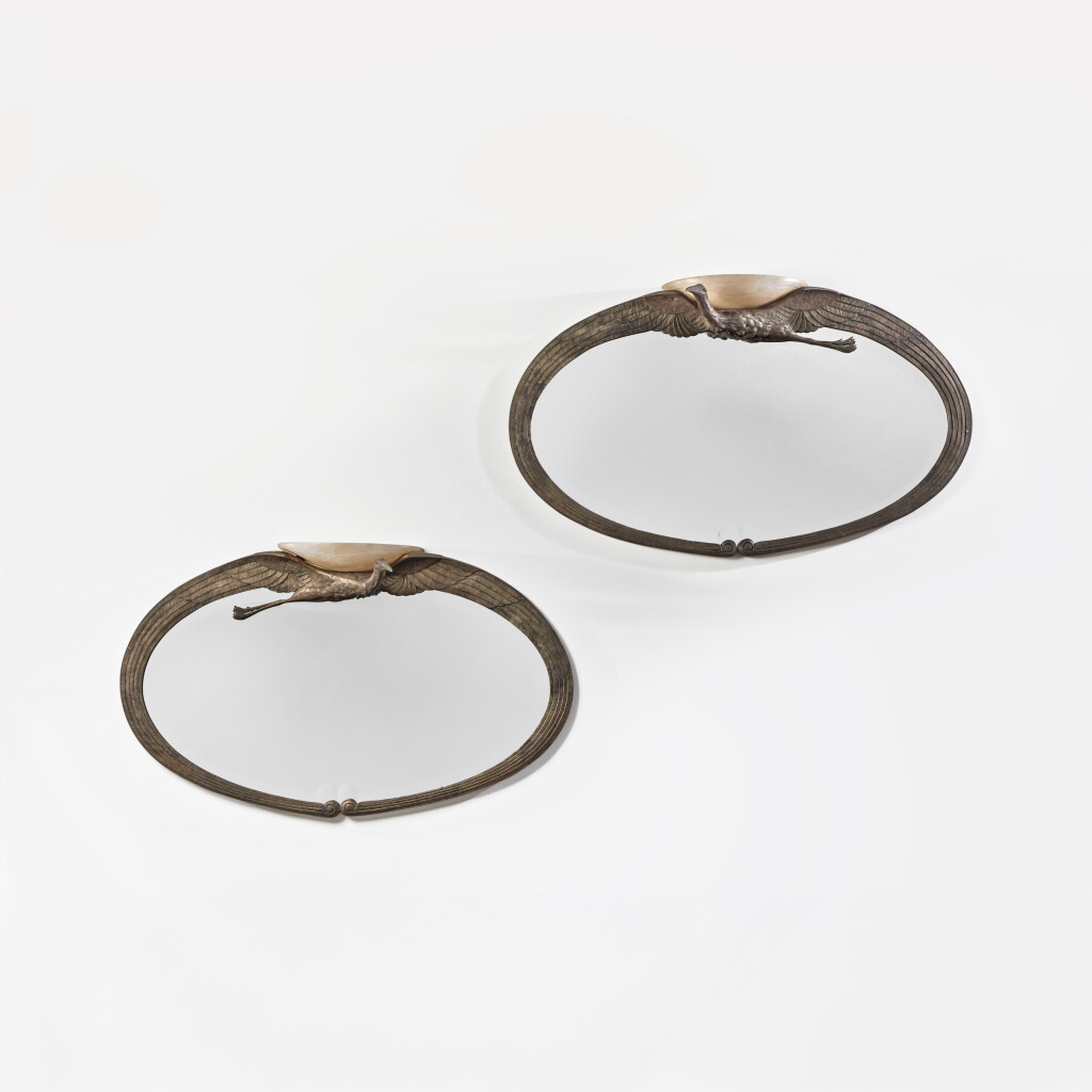 View full screen - View 1 of Lot 188. A Rare Pair of "Cigognes" Illuminated Mirrors.