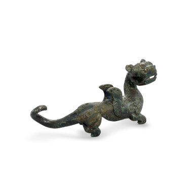 View full screen - View 1 of Lot 3031. A rare bronze figure of a winged tiger, Eastern Zhou dynasty | 東周 銅翼虎.