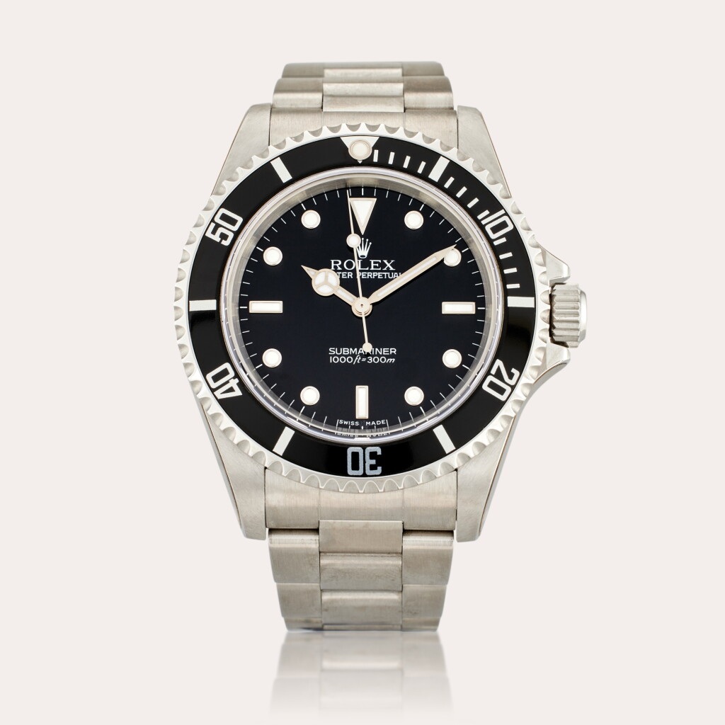 View full screen - View 1 of Lot 488. Reference 14060M Submariner | A stainless steel automatic wristwatch with bracelet, Circa 2004.