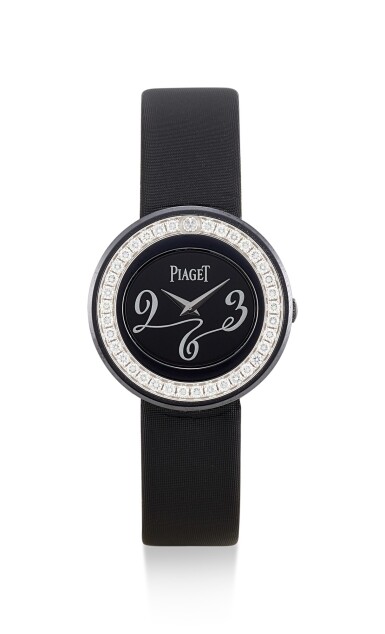 View full screen - View 1 of Lot 8177. PIAGET | POSSESSION, REFERENCE PI0402, A PVD COATED WHITE GOLD AND DIAMOND-SET WRISTWATCH, CIRCA 2014.