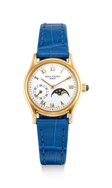 View full screen - View 1 of Lot 511. PATEK PHILIPPE | REFERENCE 4856 A YELLOW GOLD WRISTWATCH WITH MOON PHASES, CIRCA 1997.