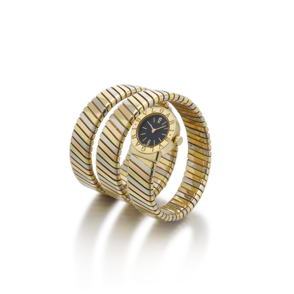 View full screen - View 1 of Lot 138. Tubogas, Reference BB 19 1T | A tri-colour yellow, pink and white gold bangle watch | Circa 1986.