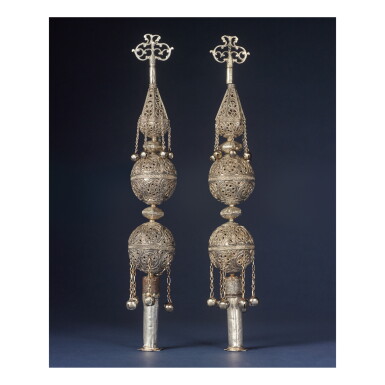 View full screen - View 1 of Lot 57. A PAIR OF NORTH AFRICAN SILVER AND FILIGREE TORAH FINIALS, LATE 19TH CENTURY.