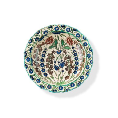 View full screen - View 1 of Lot 1171. A French faience Iznik style deep dish, Damas serie, by Edmond Lachenal, circa 1900 | Plat creux en faïence dans le style d'Iznik, série de Damas, par Edmond Lachenal, vers 1900.