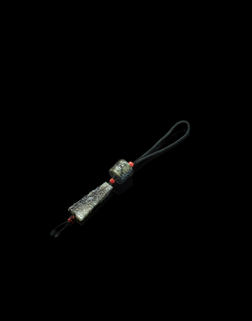 View full screen - View 1 of Lot 3803. Two small jade ornaments, Eastern Zhou dynasty, Spring and Autumn period | 東周春秋 玉雕卷雲紋飾一組兩件.
