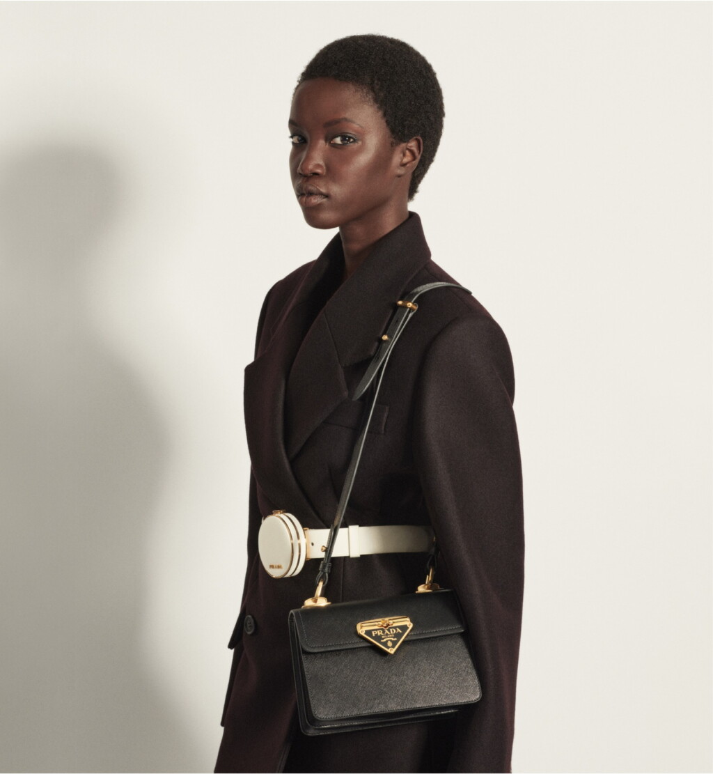 View full screen - View 1 of Lot 18. PRADA | SAFFIANO LEATHER SYMBOLE BAG. WORN BY ANOK YAI.